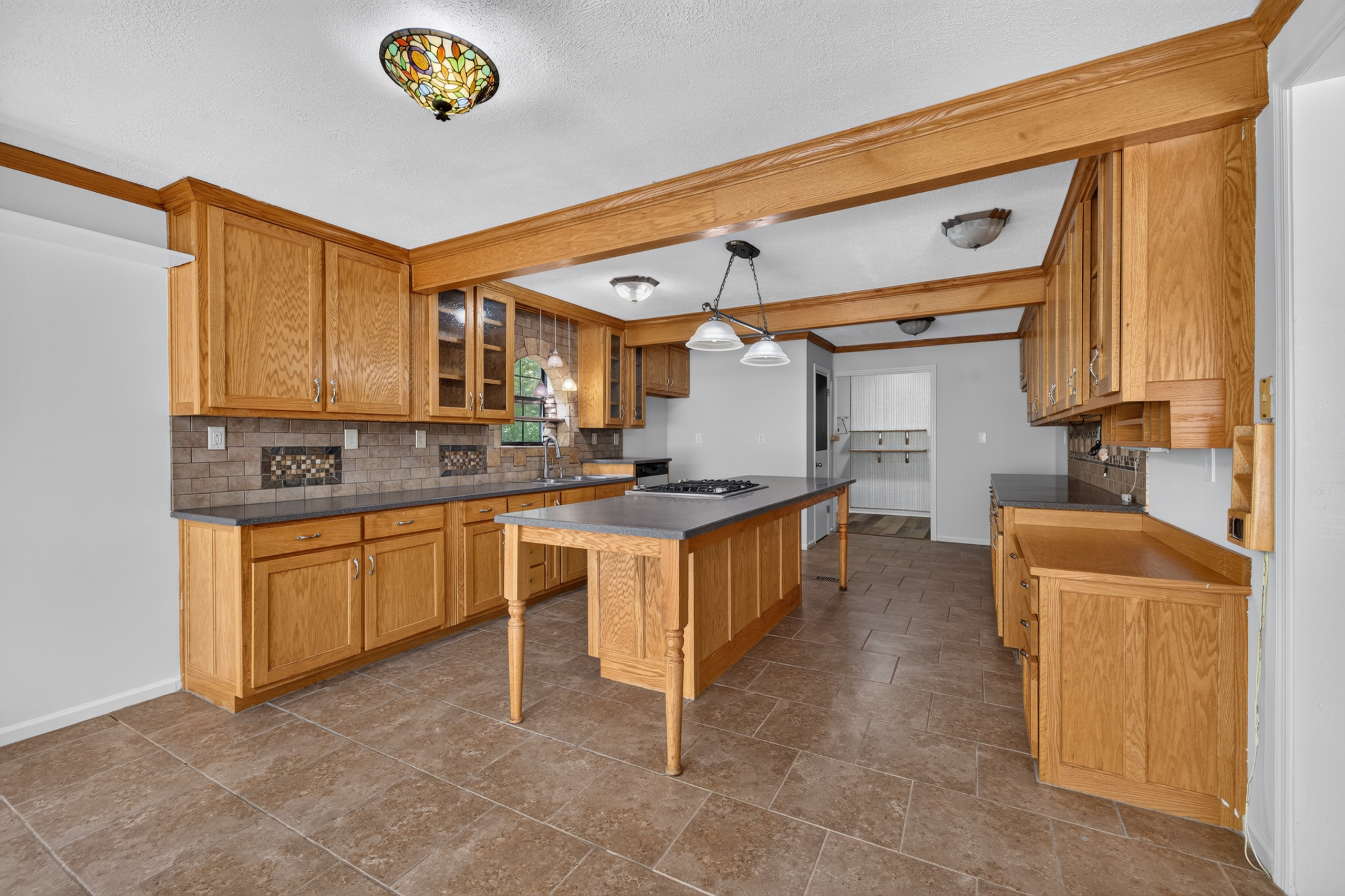 Dining room chandelier and cabinetry