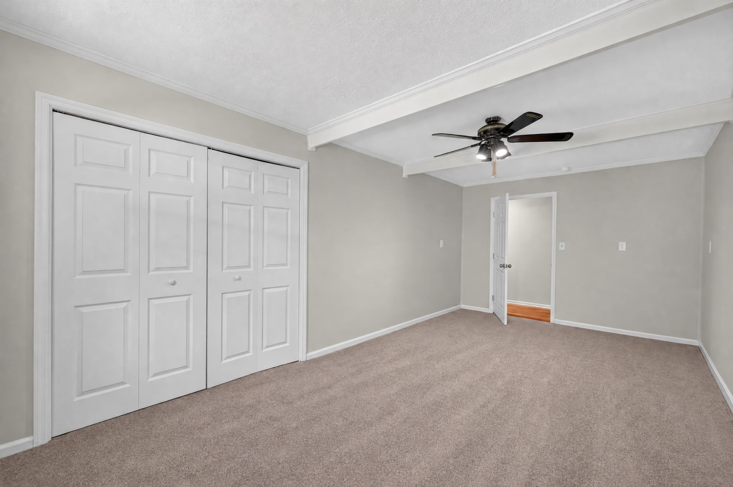 Guest bedroom with double closet