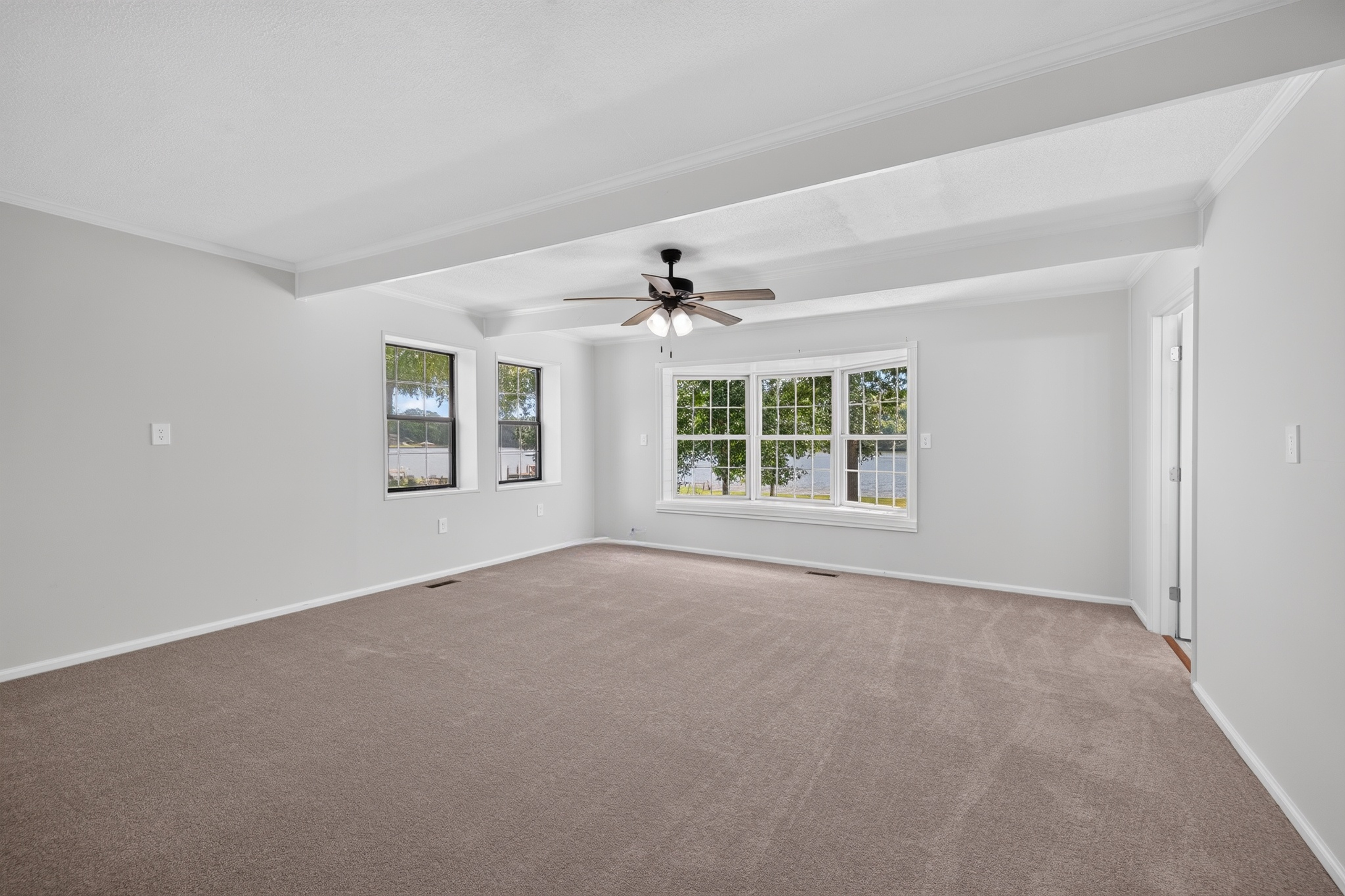 Primary bedroom layout and fan