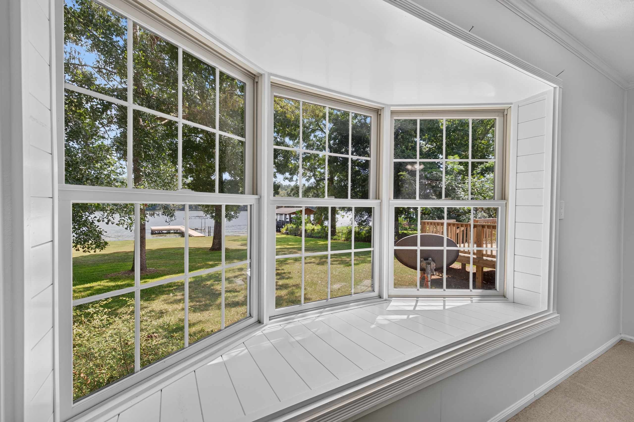 Bay window framing Lake Sinclair views