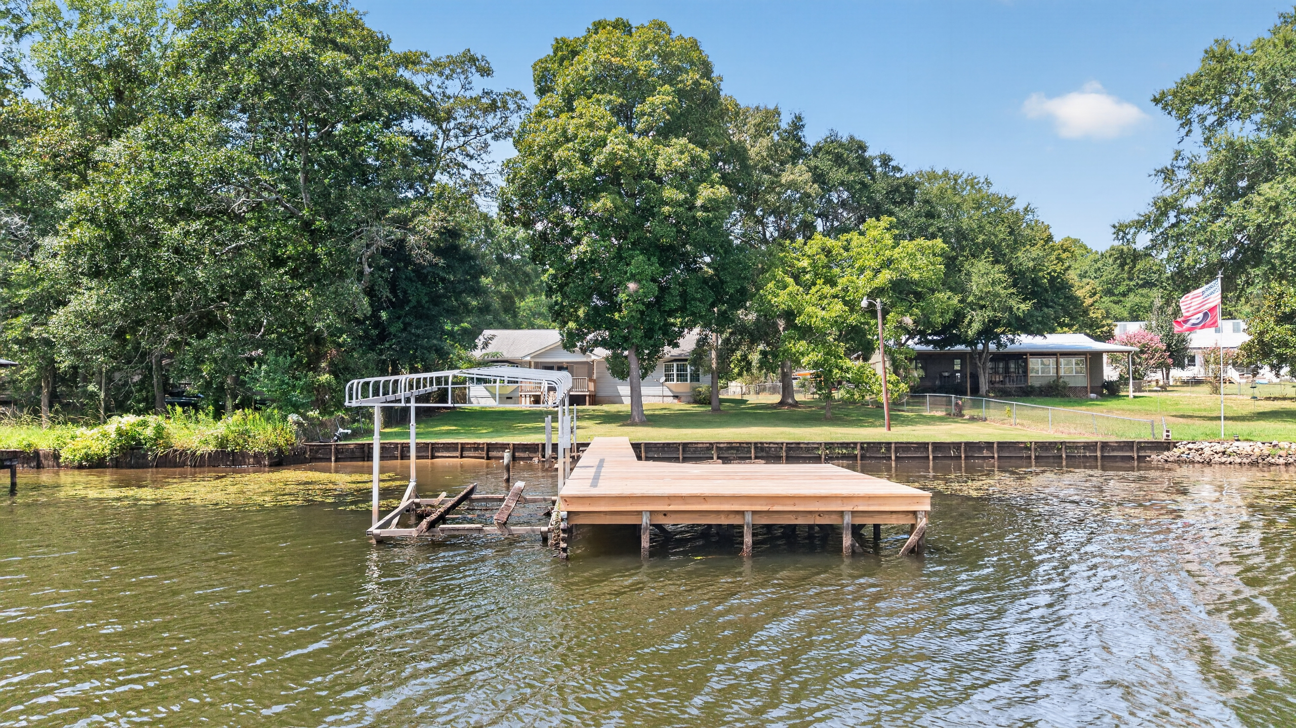 Aerial view looking down at dock and shoreline